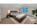 Staged main bedroom featuring a large bed, side tables, and a window with ample light at 5002 Fine Robe Dr, Indian Trail, NC 28079