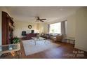 Spacious living room features hardwood floors, neutral paint, and natural light at 8405 Fairview Rd, Mint Hill, NC 28227