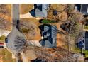 Overhead view of a property, showing the roof, yard, and surrounding neighborhood at 1517 Rice Hope Ct, Gastonia, NC 28056