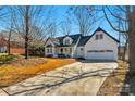 Beautiful home with a long driveway and manicured lawn at 1517 Rice Hope Ct, Gastonia, NC 28056