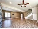 Spacious living room with hardwood floors, recessed lighting, and a ceiling fan at 1589 E Lakewood Dr, Rock Hill, SC 29732