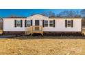 Close-up of a charming single-story home with a well-maintained yard and inviting entrance at 2005 Sugar Hill Rd, York, SC 29745