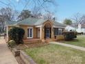 Lovely home with brick exterior, well-maintained lawn, and inviting front porch at 333 7Th Nw St, Hickory, NC 28601