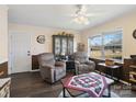 Cozy living room with ample natural light, ceiling fan, and views of the neighborhood at 506 Bond St, Cherryville, NC 28021
