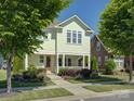 Charming home with a welcoming front porch and beautiful landscaping, enhancing curb appeal at 1538 Riverwalk Pkwy, Rock Hill, SC 29730