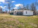 Attractive home with a brick facade, complemented by lush greenery and a well-manicured lawn at 2100 Lincolnton Hwy, Cherryville, NC 28021