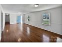 Spacious open floor plan showcasing hardwood floors and lots of natural light at 700 Hickory Ct, Gastonia, NC 28056