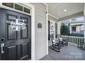 Cozy front porch with rocking chairs, offering a relaxing outdoor space at 224 Mills Ln, Fort Mill, SC 29708