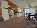 Kitchen and dining area featuring ample natural light at 4946 A Tinkers Creek Rd, Edgemoor, SC 29712