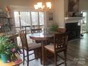 Dining area with deck access, showcasing a cozy table set and decorative elements at 194 Hattaway Cir, Mount Gilead, NC 27306