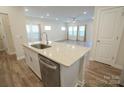 Kitchen island with stainless steel dishwasher and large sink at 3207 Lisburn St, Charlotte, NC 28227