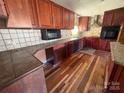 Spacious kitchen with wood cabinets at 409 S Martin Luther King Jr Ave, Salisbury, NC 28144
