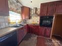 The kitchen features a stainless steel range hood at 409 S Martin Luther King Jr Ave, Salisbury, NC 28144