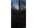A dark view from a window of a decorated tower at night at 1607 Harrill St, Charlotte, NC 28205