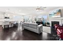 Open-concept living space with fireplace, seamlessly connecting to the kitchen at 16617 Cozy Cove Rd, Charlotte, NC 28278