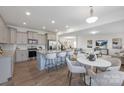 Modern, open-concept kitchen with granite countertops, stainless steel appliances, and stylish bar seating at 3010 Beacon Ave # 86, Monroe, NC 28110