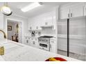 Modern kitchen featuring white cabinetry, stainless steel appliances, and granite countertops at 1221 20Th Nw Ave, Hickory, NC 28601