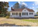 Quaint single-Gathering home with a cozy front porch and beautiful curb appeal at 308 Knox St, Clover, SC 29710