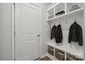 Mudroom with built-in storage, hooks, and a bench, perfect for organization at 4010 Grace Pointe Dr, Indian Trail, NC 28079