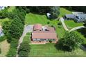 Aerial view of home featuring large yard and parking spaces at 9808 Washam Potts Rd, Cornelius, NC 28031