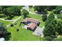 Aerial view of home featuring a spacious yard and outdoor fire pit at 9808 Washam Potts Rd, Cornelius, NC 28031