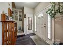 Inviting foyer with hardwood floors, a bright entrance, and stylish decor, creating a warm welcome at 140 Reid Ln, Pineville, NC 28134