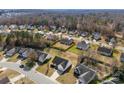 Areal view of residential neighborhood with mature trees, manicured lawns and a community feel at 5140 Hildreth Ct, Concord, NC 28025