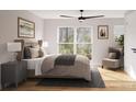 Serene main bedroom with a large window, ceiling fan, accent chair, and neutral decor with wood flooring at 550 Beatties Ford Rd, Charlotte, NC 28216