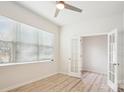 Bright home office with open doors to closet and large window at 15119 Oleander Dr, Charlotte, NC 28278