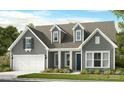 Charming single-Gathering home featuring a gabled roof, attached garage, well-maintained lawn, and inviting curb appeal at 2227 Indigo Branch Rd, Indian Land, SC 29707