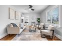 Neutral living room featuring lots of seating, natural light and hardwood floors at 3606 Buffalo Shoals Rd, Newton, NC 28658