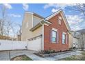 Beautiful home featuring a brick facade, attached garage, and manicured landscaping at 558 Rough Hewn Ln, Rock Hill, SC 29730