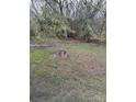 View of the yard with trees and grass from the back of the property at 1010 13Th St # 11, Lancaster, SC 29720