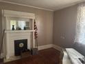 Cozy living room features a decorative fireplace and vintage accents at 129 Maupin Ave, Salisbury, NC 28144