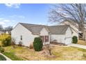 Home's rear exterior showcasing the roofline, siding, and surrounding landscaping at 162 Pecan Hills Dr, Mooresville, NC 28115