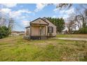 Charming single-story home with a small front porch and a cozy, traditional design at 202 Hovis Rd, Stanley, NC 28164