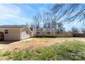 Large backyard featuring a detached garage, a mix of grass and open space at 345 Briar Creek Rd, Gastonia, NC 28056