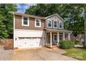 Charming two-story home with a welcoming front porch and well-maintained landscaping at 3675 West Bay Dr, Sherrills Ford, NC 28673