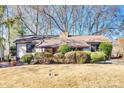 Single-story home showcasing a front porch and mature landscaping, complete with an inviting front yard at 5011 Tara Tea Dr, Tega Cay, SC 29708