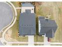 Aerial view of the home showcasing the roof, driveway, and landscaping in a suburban neighborhood at 5041 Wakehurst St, Kannapolis, NC 28081