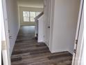 Inviting foyer with luxury vinyl plank flooring and staircase to the upper level at 2792 5Th Ne Ave, Hickory, NC 28601