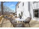 Spacious outdoor deck area with modern patio furniture for entertaining and relaxing at 301 Dollar Cir, Charlotte, NC 28270