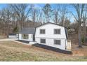 Attractive two-story home with a well-manicured front yard and black accents at 301 Dollar Cir, Charlotte, NC 28270