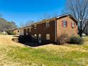 Brick home featuring a well-maintained backyard and easy access at 344 Circleview Dr, Shelby, NC 28150