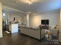 Spacious open-concept living area featuring modern design, plenty of sunlight, and seamless flow at 404 N Laurel Ave # 28, Charlotte, NC 28204