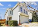 Two-story home with a garage and well-kept lawn at 1021 Joselynn Dr, Gastonia, NC 28054