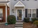 A welcoming home entrance with a covered doorway and well-maintained landscaping at 1752 Hidden Creek Dr, Rock Hill, SC 29732