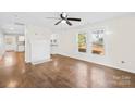 Bright living room with hardwood floors, fresh paint, and a decorative fireplace at 216 Blackwelder St, Kannapolis, NC 28081