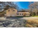 Two-story home with a well-maintained yard, complemented by a spacious driveway and mature trees at 4919 Rehobeth Rd, Waxhaw, NC 28173