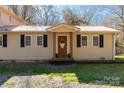 Charming home with a new metal roof, complementary shutters, and a welcoming front entrance at 4919 Rehobeth Rd, Waxhaw, NC 28173